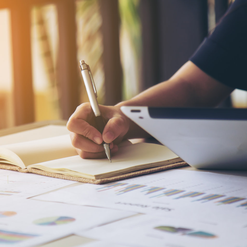 Business women signature at document. Selective focus and soft flare filter.